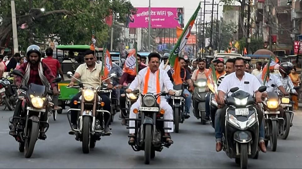 BJP members took out a bike rally without helmets