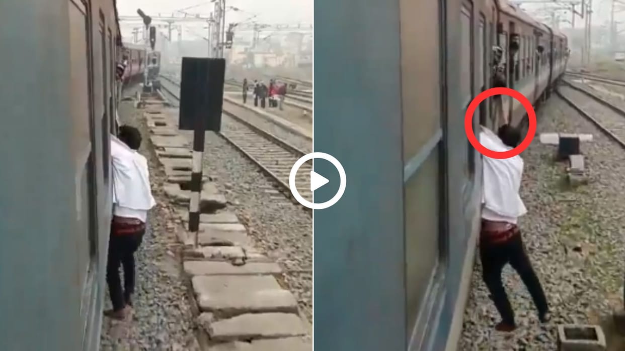 A passenger caught thief hand and man was hanging for a long distance video went viral in hindi