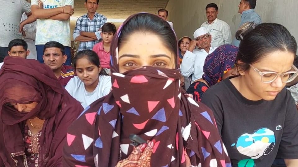 Baghpat: Wedding is at night, bride sitting on dharna in the afternoon with henna decorated on her hands