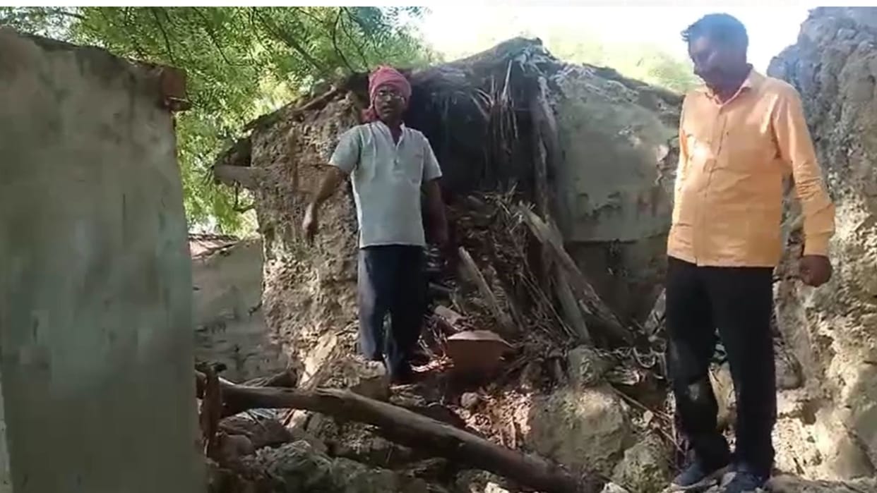 A kutcha house suddenly collapsed small children narrowly escaped goods destroyed