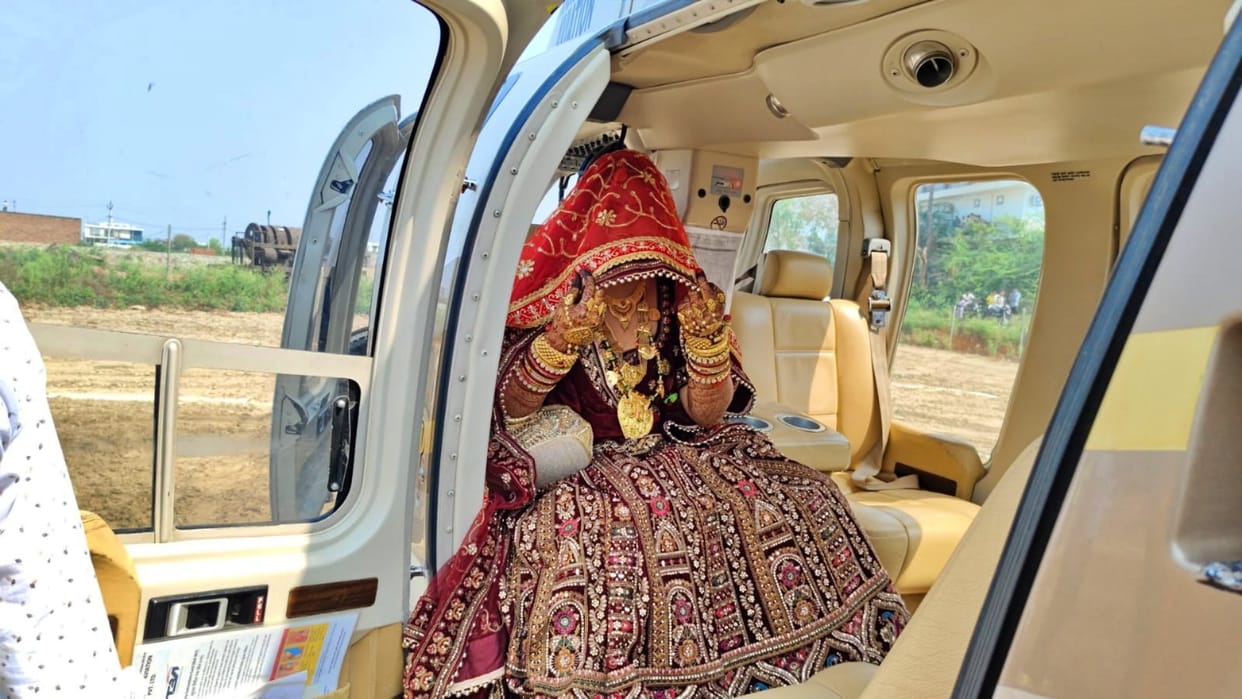 bride arriving by helicopter