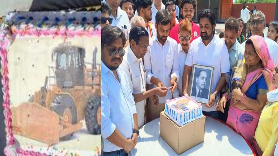 Bulldozer cake was cut in Agra on Ambedkar Jayanti