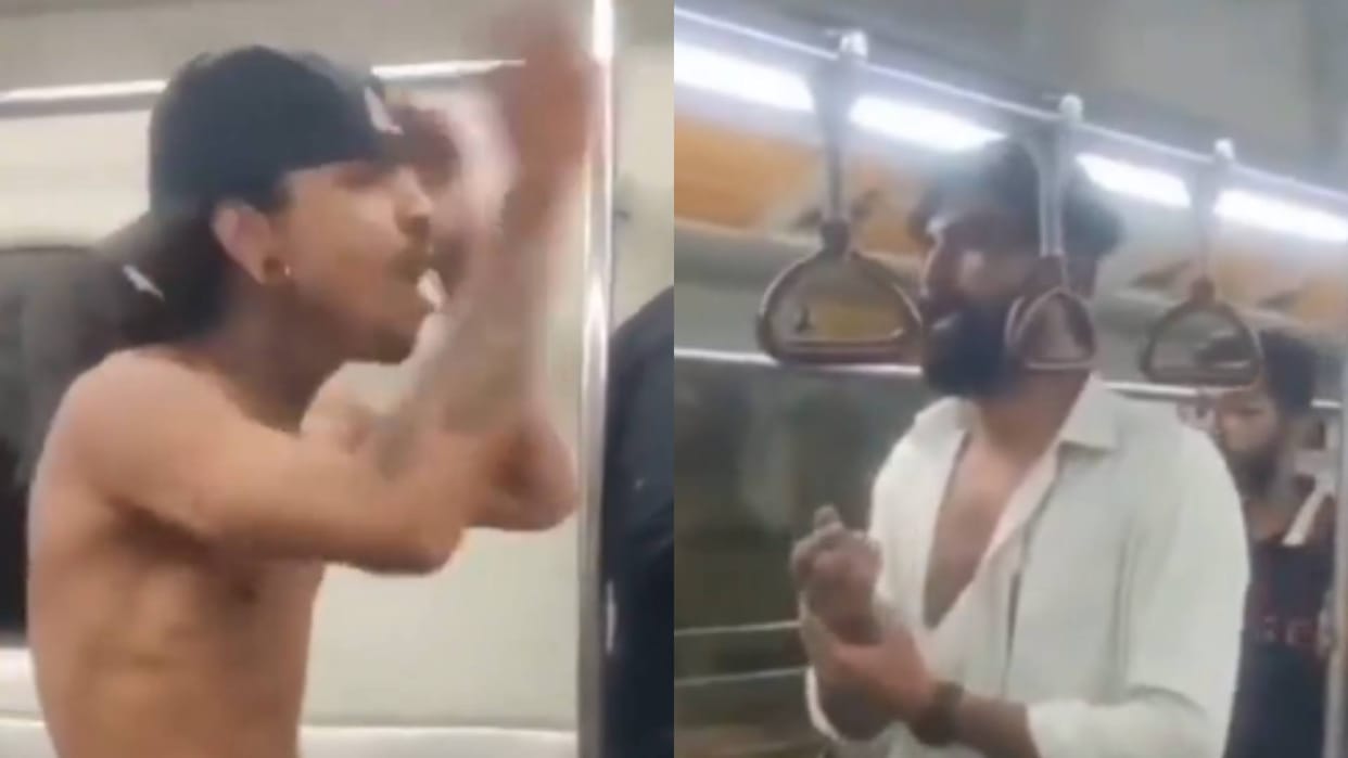 Two passengers clashed in Delhi Metro beat and tore each others clothes Video goes viral on Internet
