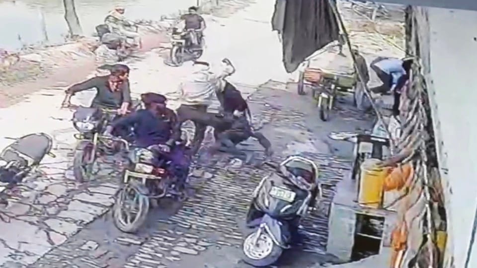 In village Kalai, a trader was dragged out of his shop and beaten up