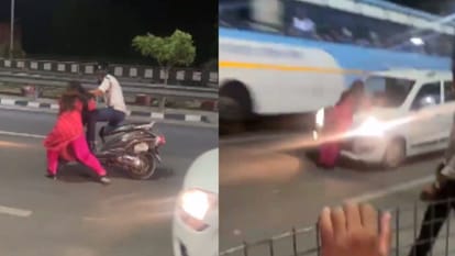 Haridwar People scared by actions of woman kept attacking  passing vehicles video viral