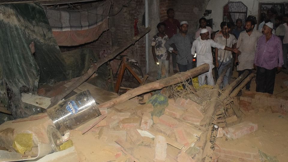 House collapsed after a neighbour wall fell on roof Eight buried, mother and daughter died In Meerut