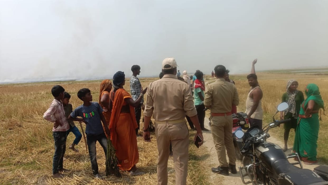 Due to unknown reason the harvested wheat crop caught fire