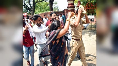 misbehaved with the police after stopping from burning Mamata Banerjee's effigy in Meerut. Inspector cap throw
