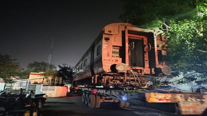 Railway coach brought by truck for restaurant at Bareilly Junction