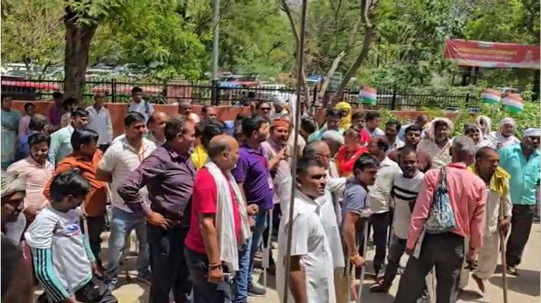 handicapped person attempted self immolation by pouring petrol at DM office