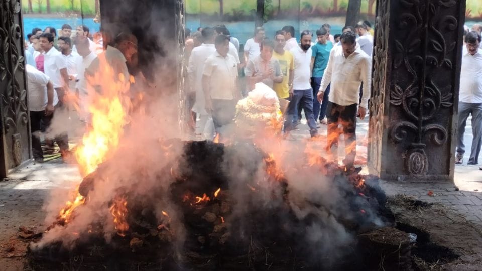 Dinesh Mirnia who was killed in terrorist attack, was cremated by his son Shaurya