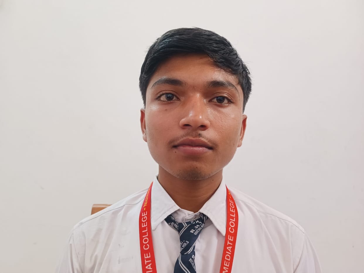 Abhishek of Maharajganj has become the district topper in UP Board Inter