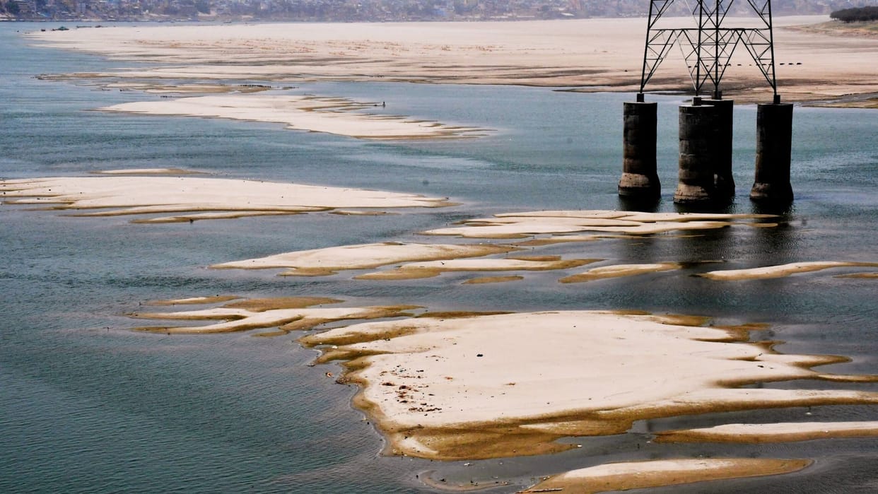 summer Ganga started leaving ghats area of sand is 4 times wider than river water decreasing every year