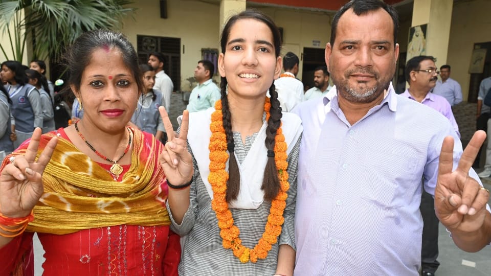 UP Board Result 2025 Father drives an auto daughter flies high in state with marks secures seventh position