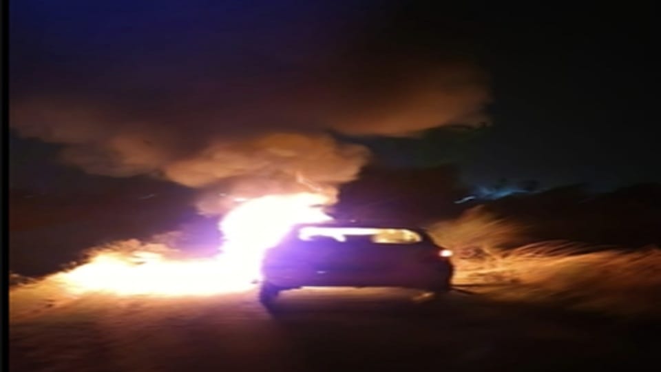 A sudden fire broke out in a moving car