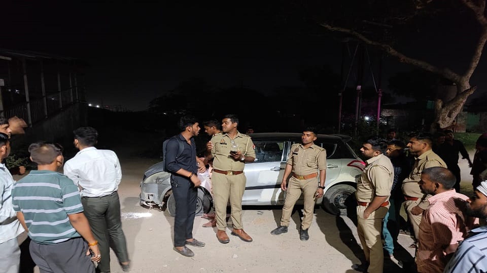 dispute arose when a bike collided with a car in a heavy traffic jam firing took place