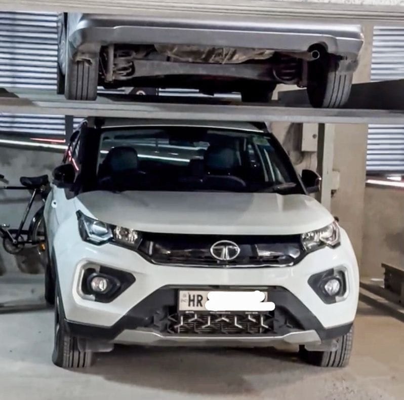 Tata Nexon SUV Survives Parking Lift Fall Know Details