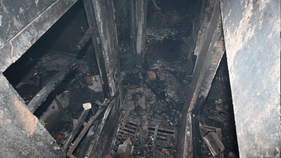 Kanpur Fire Incident fire on ground floor and lock on stairs to roof see photos