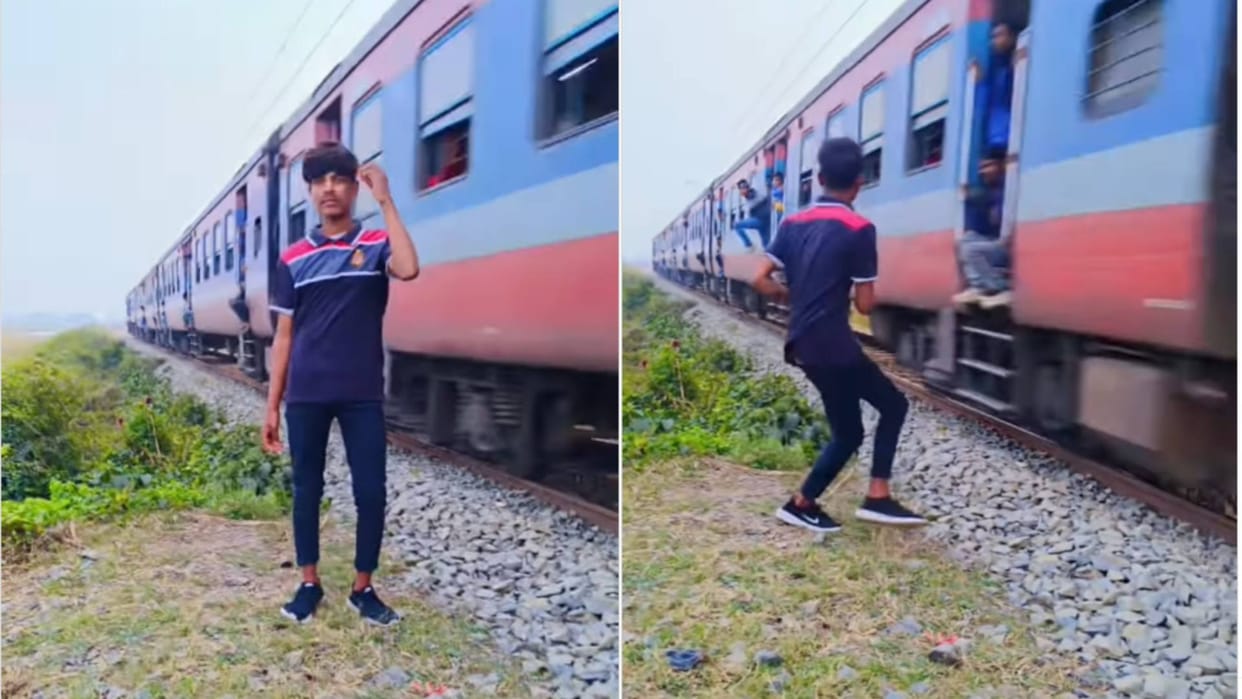 A man was making a reel standing near the railway track a passenger sitting in train kicked him Video Viral