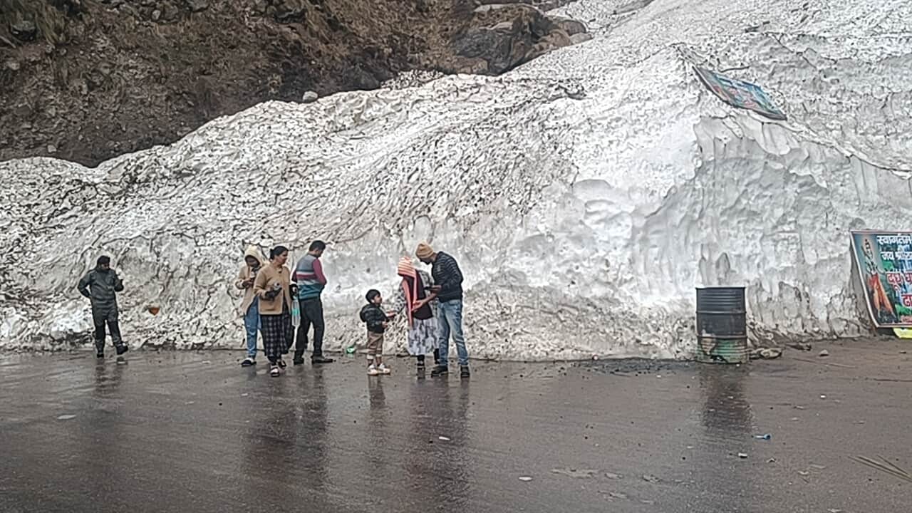 Badrinath Yatra 2025 Passing through iceberg became a curiosity for devotees Photos