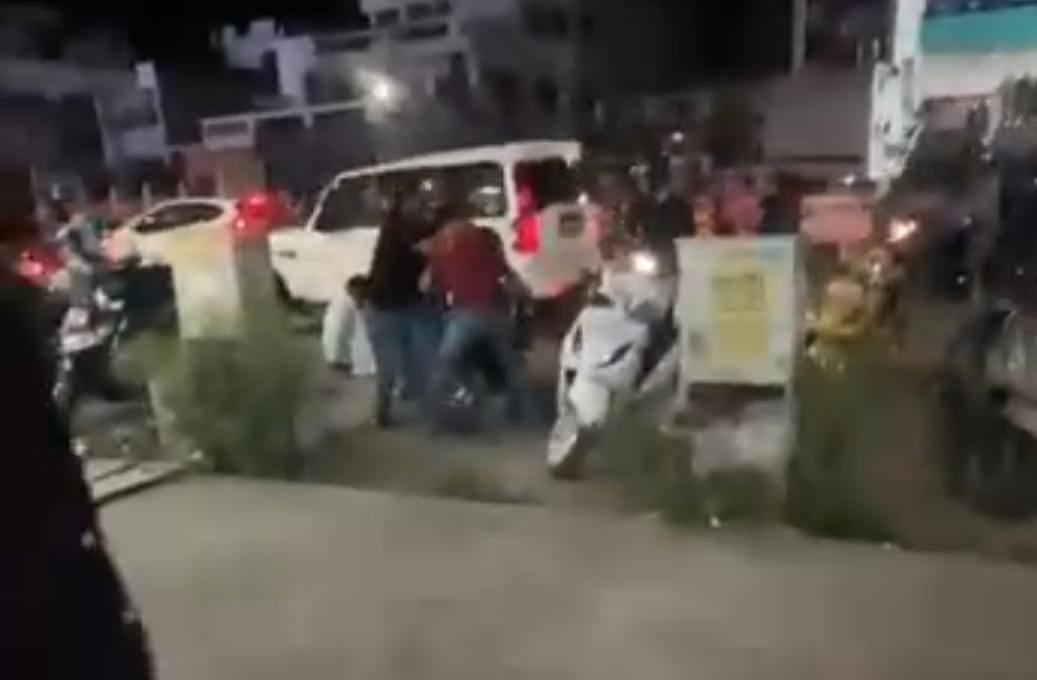 Haridwar Crime News Fight in public Places bullet fired from a gun hit the youth hand and he injured himself