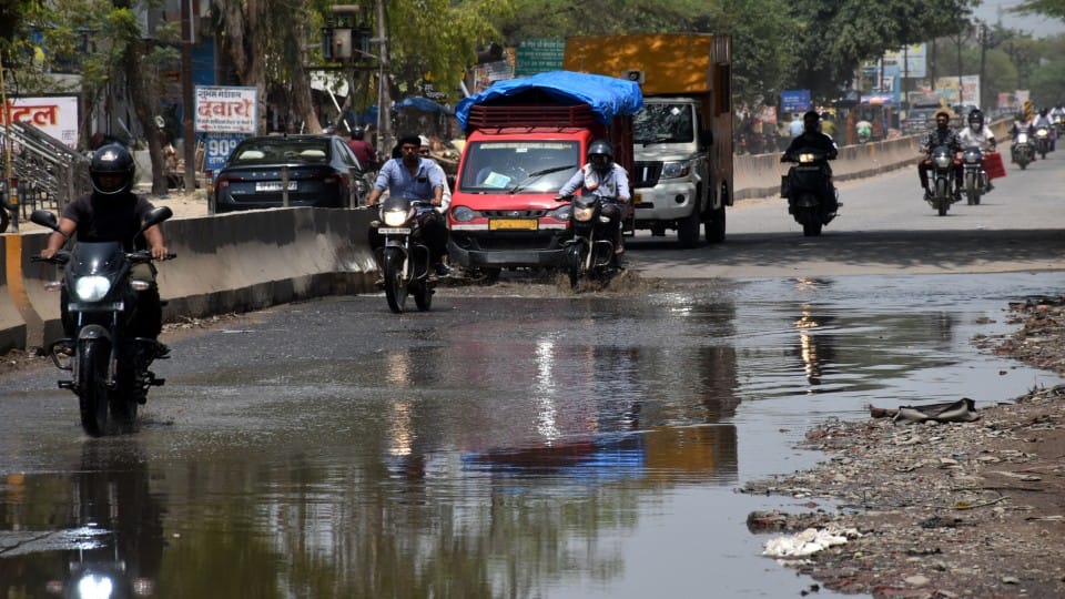 Pond on the road without rain