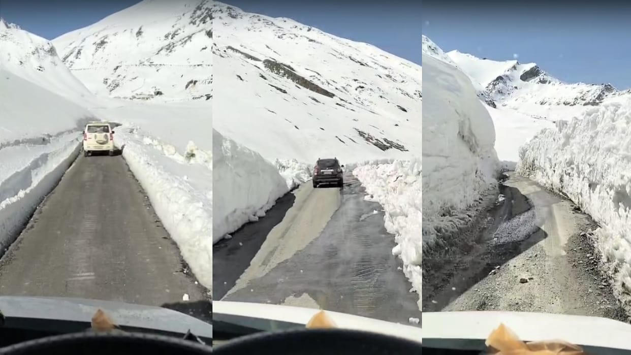 After 46 days, tourist vehicles ran through several feet high walls of snow on the Manali-Leh road