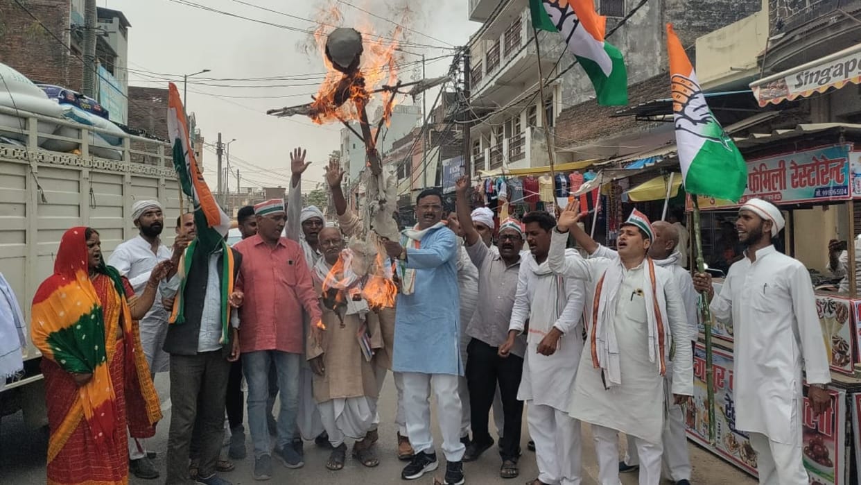 Case of objectionable comment on female military officer Congressmen burnt the effigy of cabinet minister