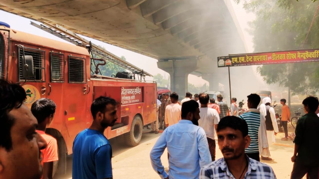 Fire causes loss of lakhs Goods burnt to ashes in tent shop fire brigade arrived after one hour people angry