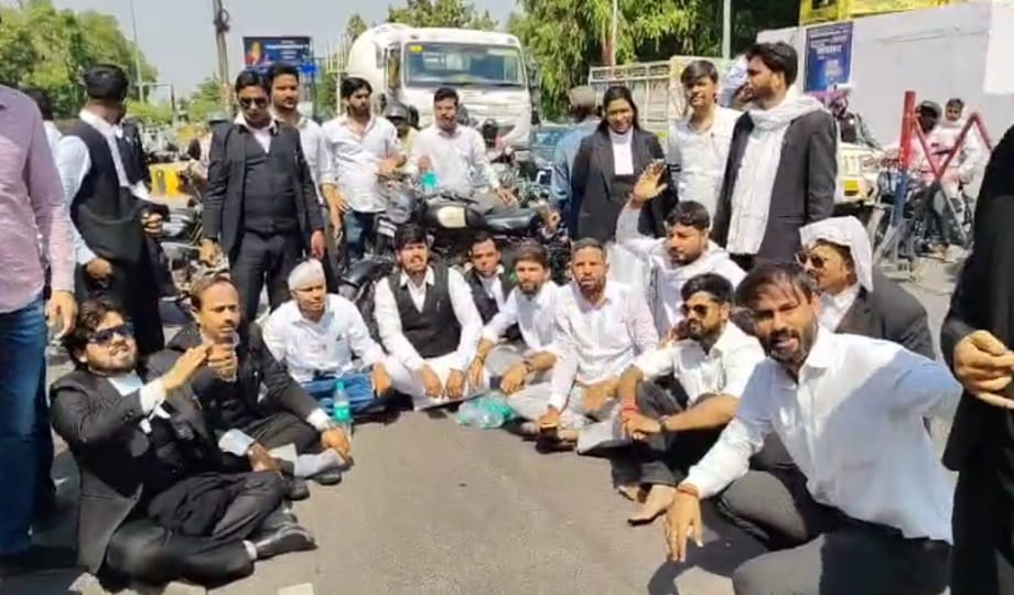 Angry advocates blocked the road after their colleague was beaten up