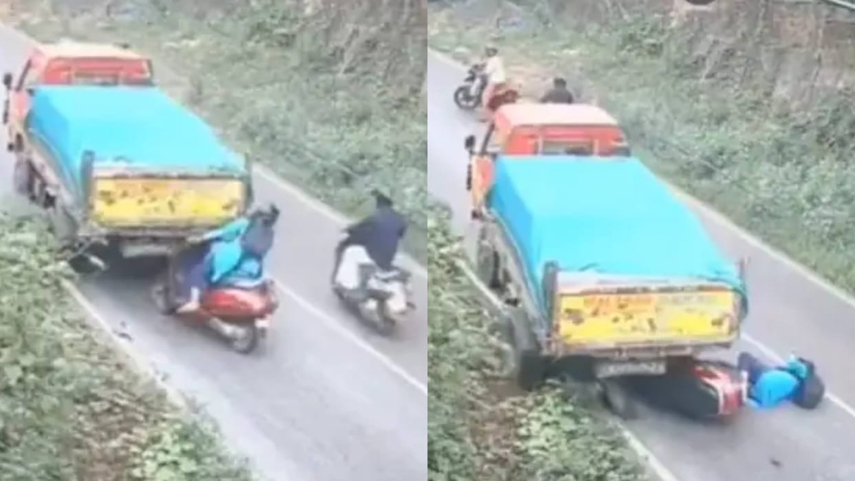 Woman narrowly escapes death truck runs over scooter on highway Video goes viral