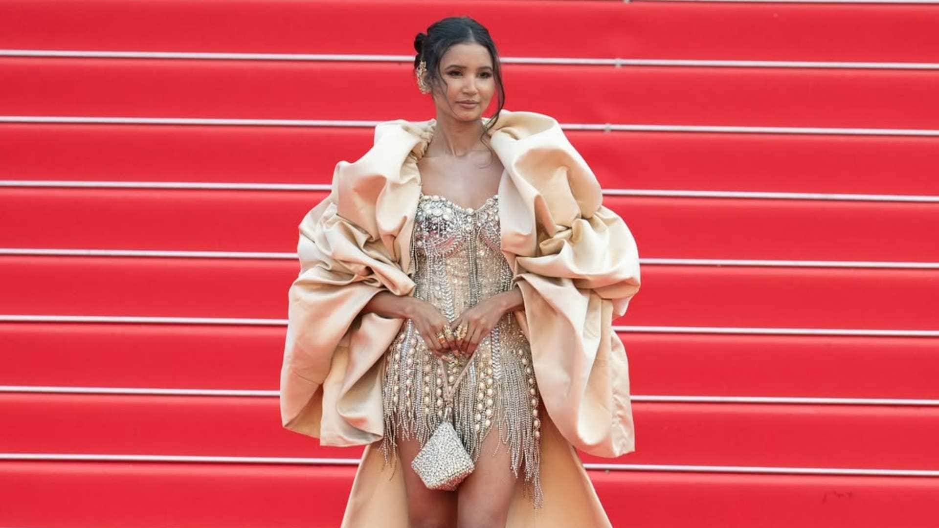 Nancy Tyagi Is The Real Star At Cannes 2025 wore Self Stitched Pearl Embellished Mini Dress And Dramatic Cape