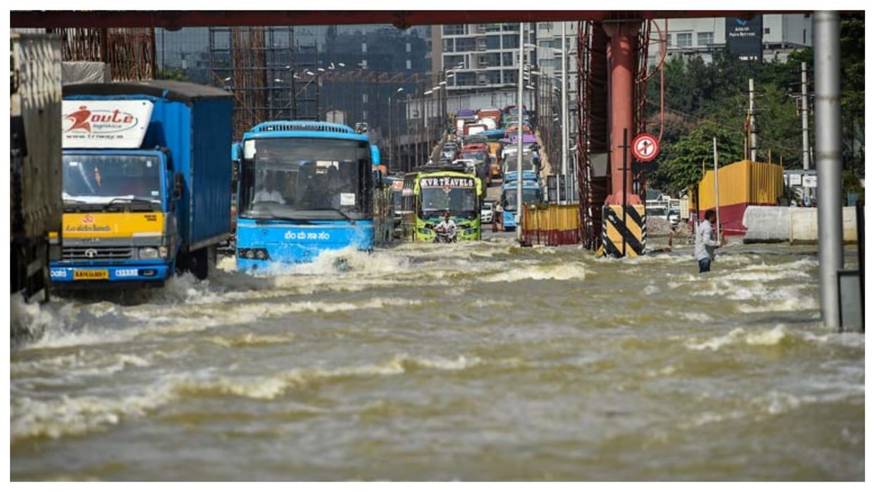 bengaluru heavy rain causes waterlogging mla visit affected areas on bulldozer