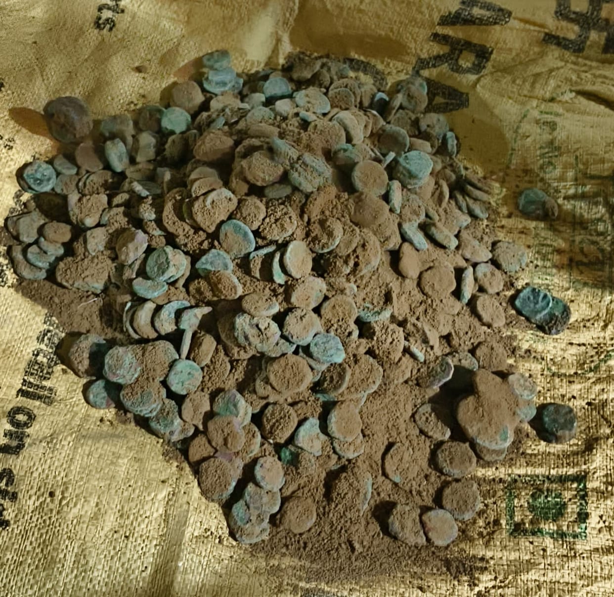 Copper coins found during excavation in an ancient temple
