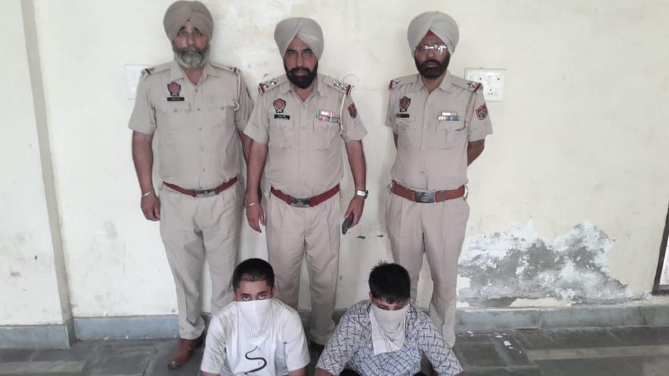 Gurdaspur Police apprehending two persons involved in leaking sensitive military information