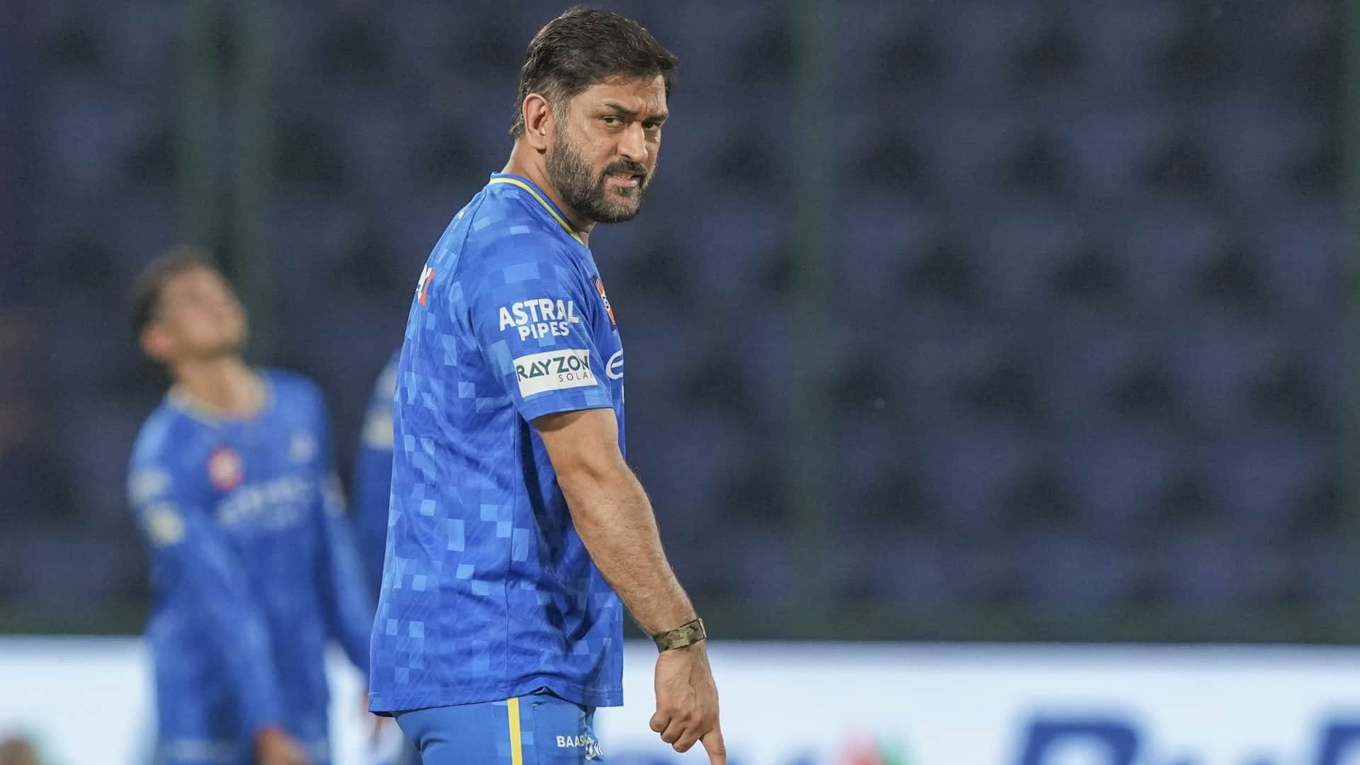 CSK captain MS Dhoni had a heartwarming meet-up with a young fan as he jumped over fence to meet him IPL 2025