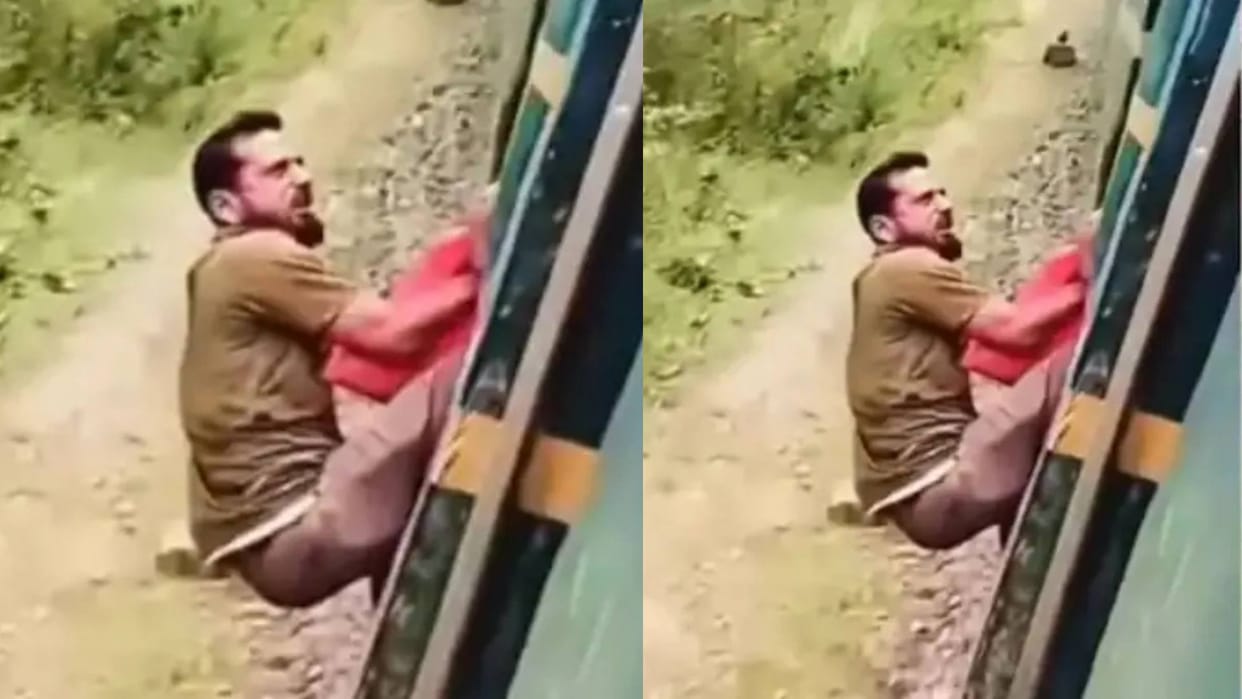 A thief who was stealing in a train was punished by hanging him on the gate Video goes viral on Internet