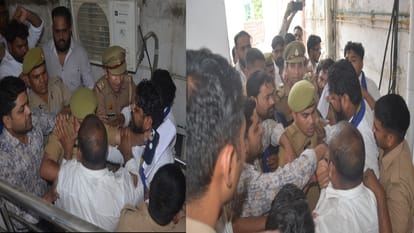 employee put pictures of Baba Saheb and Mahatma Buddha on floor of hospital