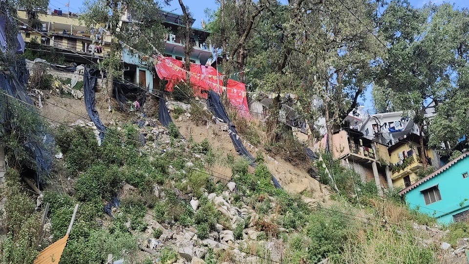 Tarpaulin support to prevent landslides at Charlton Lodge Nainital