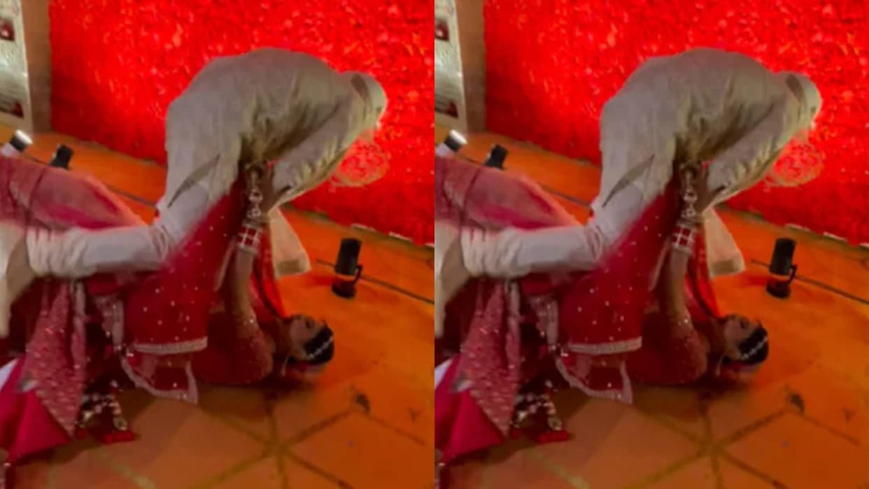 groom was getting his photo clicked with the bride in his arms suddenly girl fell on her face video viral