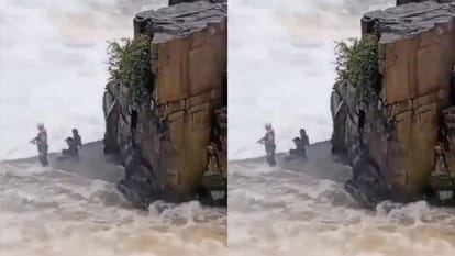 जान पर खेलकर लड़कों ने पकड़ी मछली