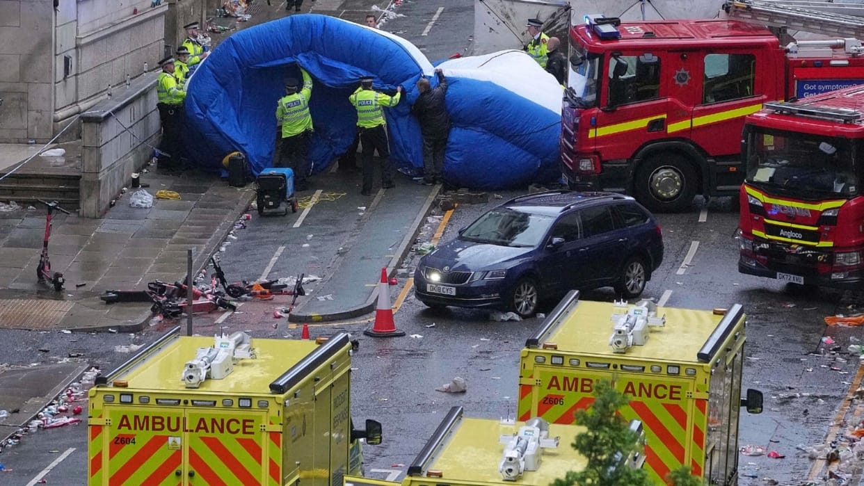 car ploughed into a crowd of Liverpool fans during parade celebrating their Premier League soccer title