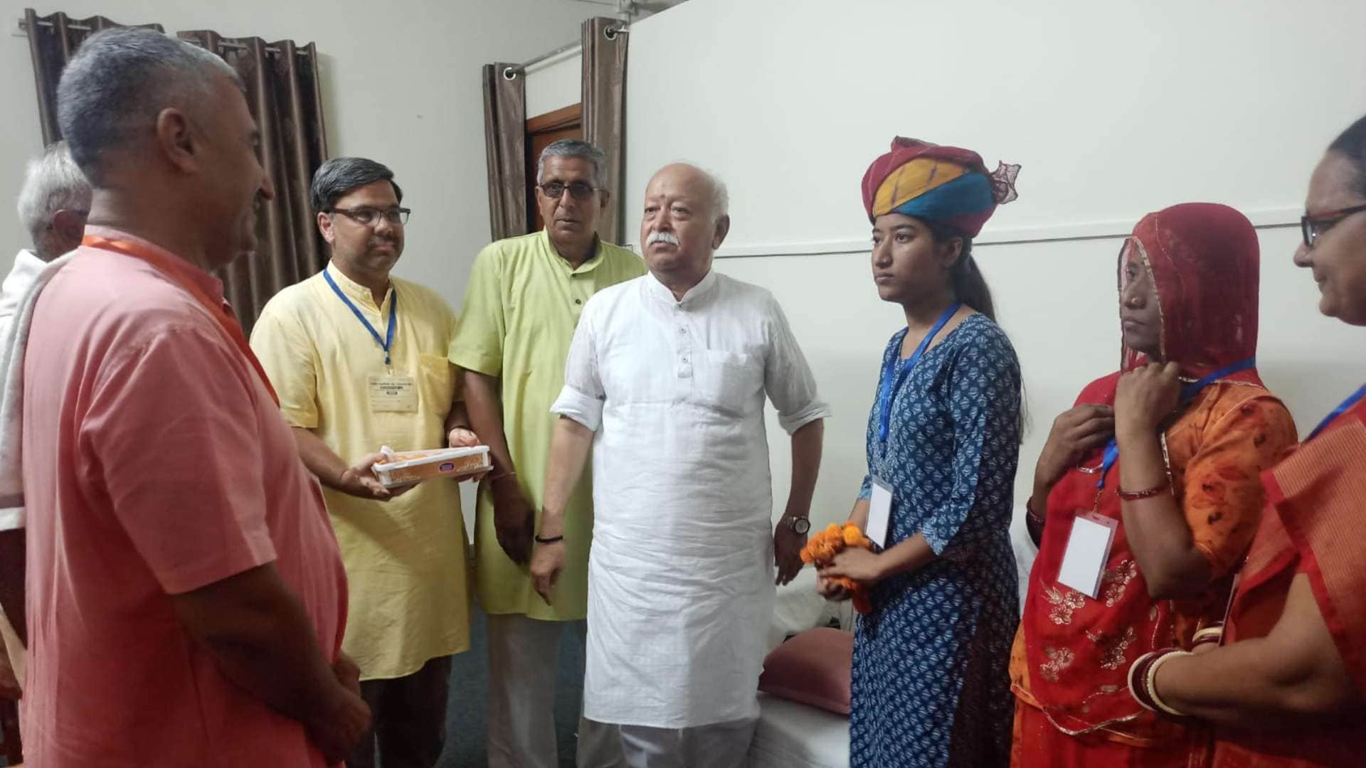 rajasthan news shyamsar girl pooja tops 10th board rss chief congratulates with sweets