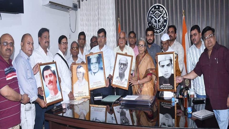 Pictures of journalists displayed in information office