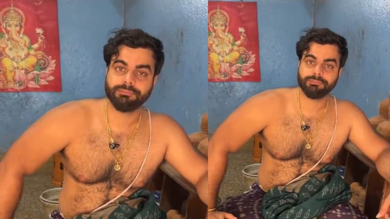 a man who looked like Virat kohli was seen distributing prasad at a temple video viral