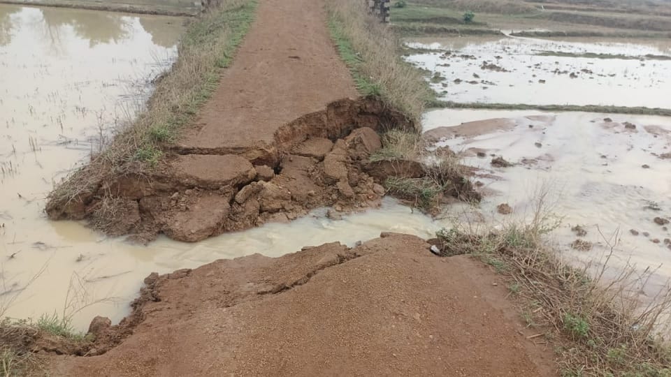 Due to heavy rains, the main road of the village got damaged and traffic was affected
