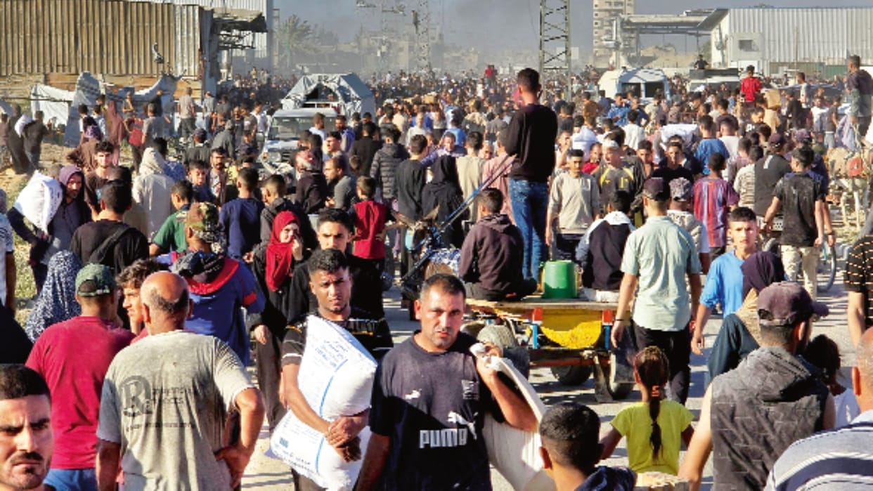 West Asia Unrest Palestinians loot food from UN trucks in Gaza Strip