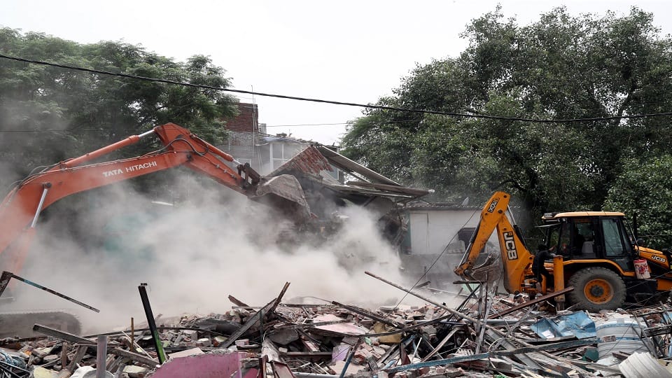 Why bulldozer used in Madrasi camp there was problem during monsoon