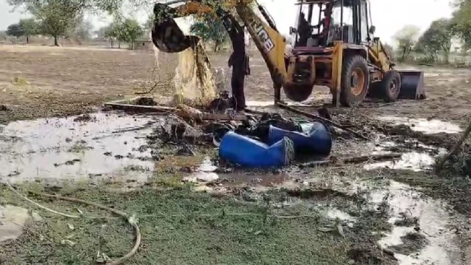 Police destroyed illegal liquor filled in plastic drums