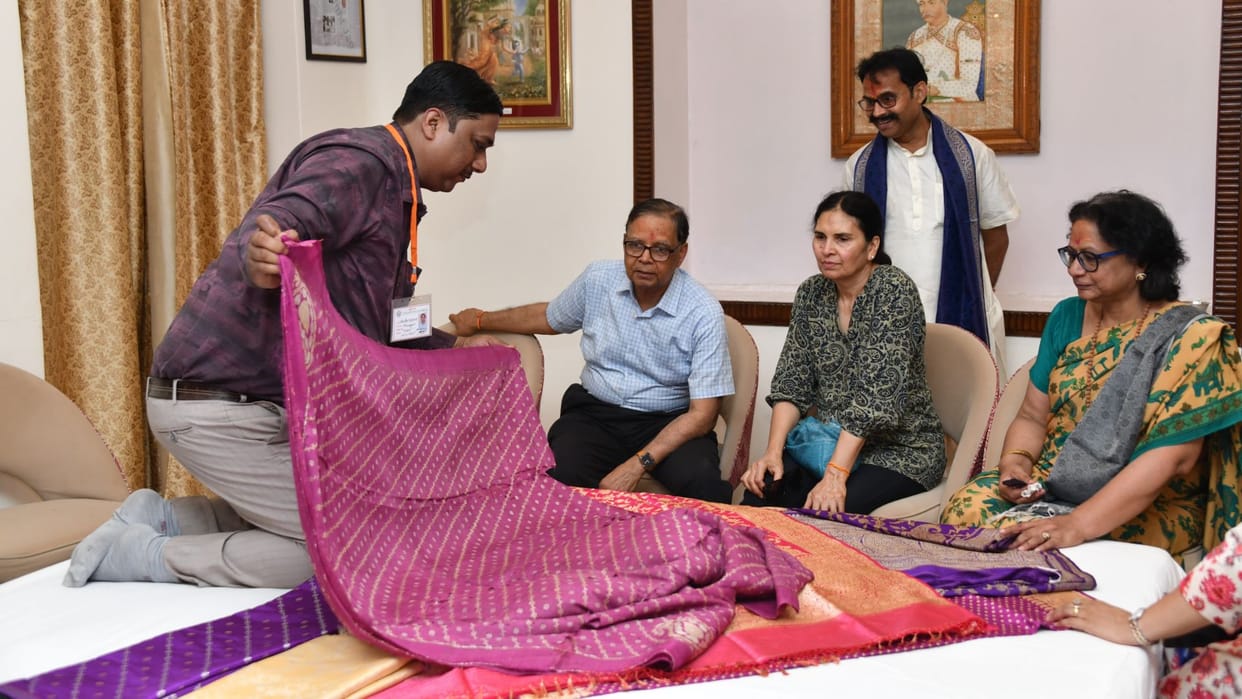 Finance Commission team visited kashi and saw workmanship done on 250 years old saree